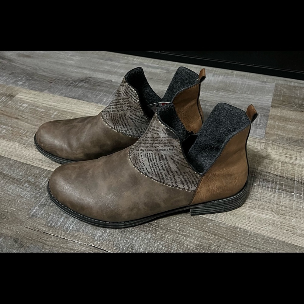Rieker rare news print ankle boots size 41.